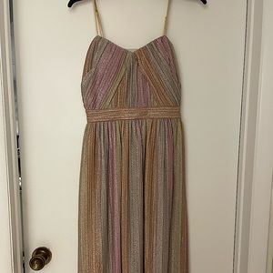 Beautiful shimmery knee length dress. Perfect for the upcoming holiday season.